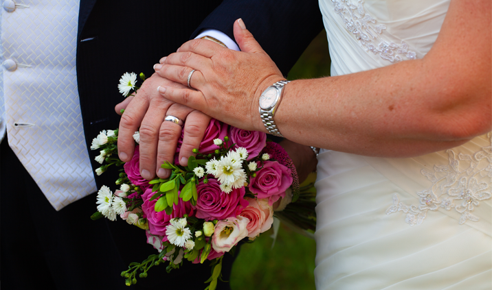 Renewal of wedding vows with a bouquet of flowers